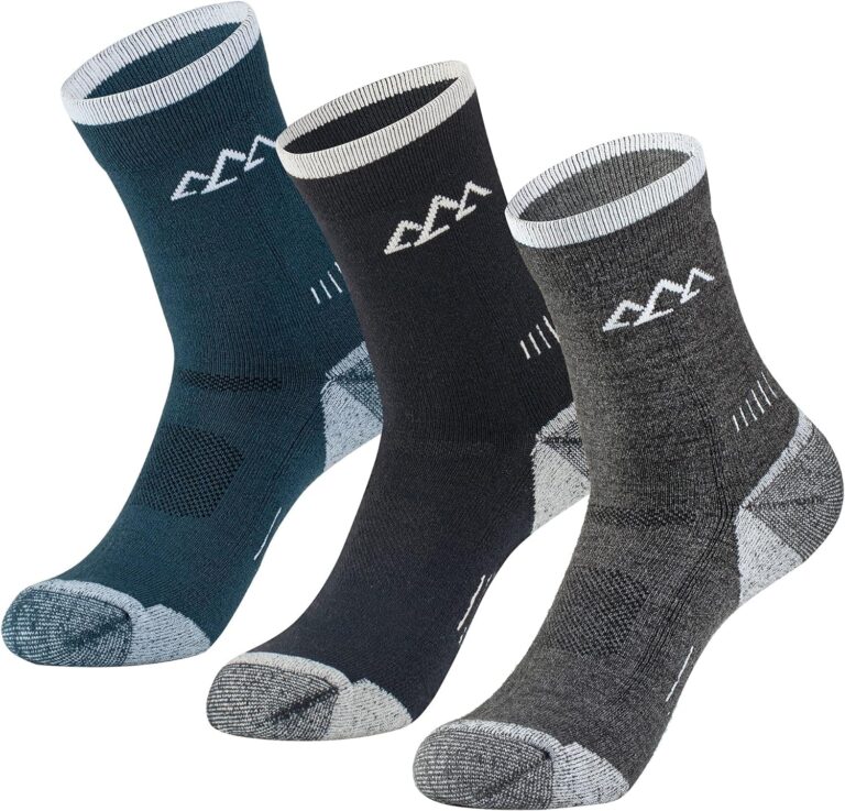 Three pairs of hiking socks in different shades of gray and blue