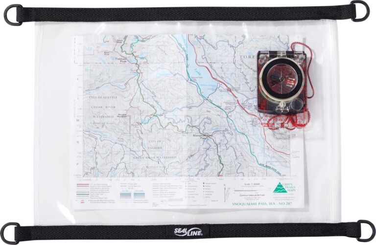 Map and compass inside a waterproof bag, ready for outdoor navigation